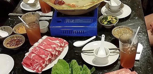 The hotpot table with our ingredients to add to the broth.