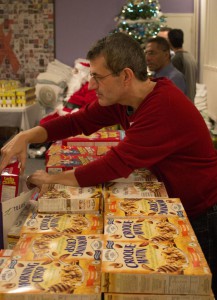 Volunteer helping at the Holiday Grocery last year