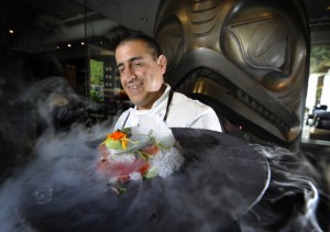 Vancouver  , BC,  July 25,  2012   -- Chef Jefferson Alvarez uses ice creams, sorbets and granitas in the savoury portions of his tasting menus in hot weather.  Here he shows a special tuna dish made with liquid nitrogen, which creates a dramatic cloud of condensation in West Vancouver on  July 25,  2012.   ***pls notesmoke needs to be KEPT in frame!....)     (Mark van Manen/PNG Staff     See   Vancouver Sun Mia Stainsby  Ent. stories  00062938A