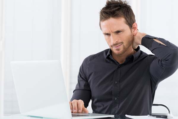 Businessman Tired Working On Laptop