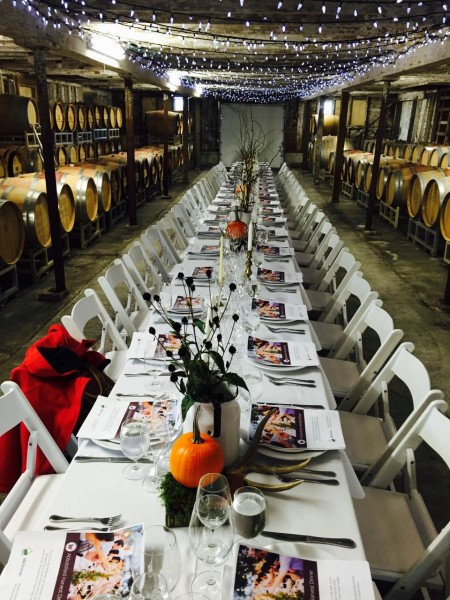 Family style seating in the barrel room