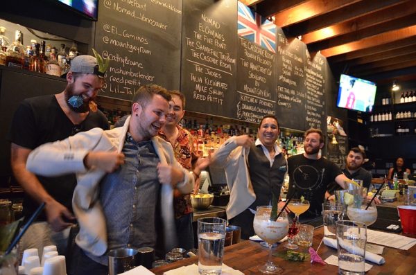 Nomad's Matt Van Dinther and Matt Benevoli don their Mount Gay jackets as the first Judges' Choice winners of the Main Street Cup competition