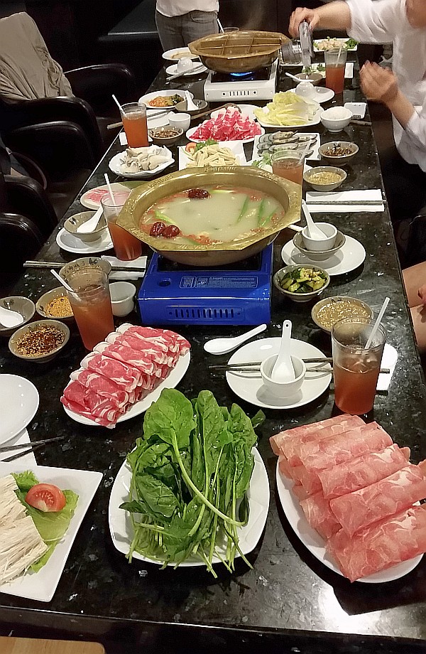 The hotpot table with our ingredients to add to the broth.