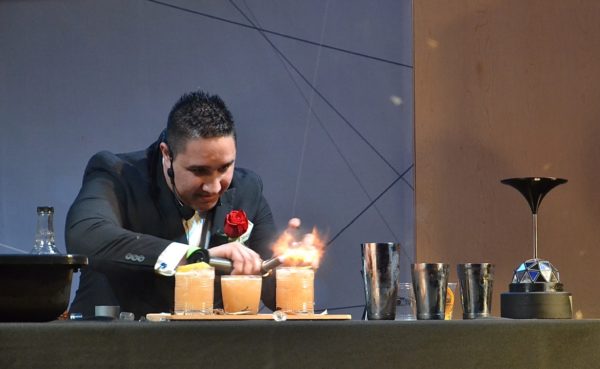 Cocktail Competition winner Matt Benevoli playing with fire - photo by Cathy Browne