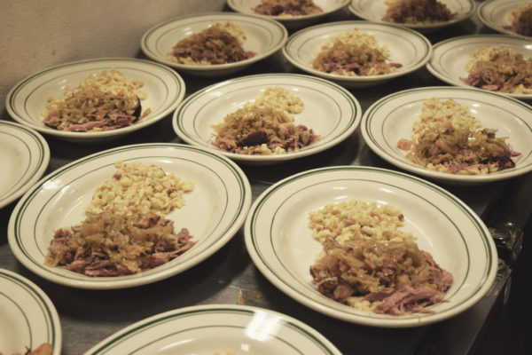 The main course at Save-On Meats -Choucroute Garnie – smoked sausage + Reisling fermented cabbage + Spaetzle + brown butter cream. Photo courtesy of the French Consulate