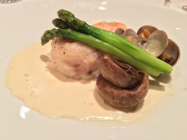 The Sole Normande featured a perfectly cooked filet on a cream sauce with a seafood medley, button mushrooms and asparagus spears - photo by Cathy Browne