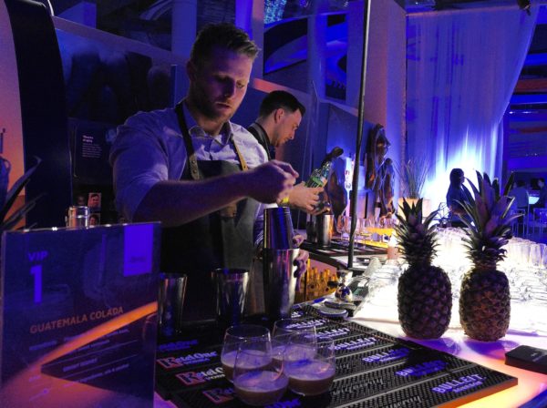 Former World Class Canada winner Grant Sceney pouring signature cocktails in the Science of Cocktails VIP Lounge. Photo by Cathy Browne.